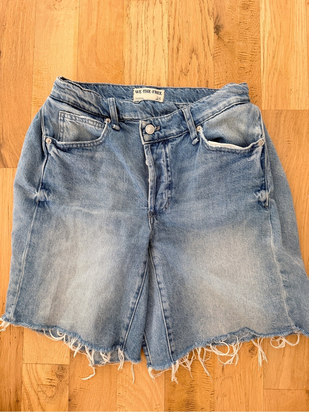 We The Free faded blue frayed hem denim shorts